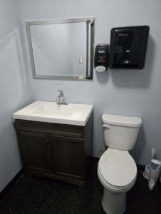 A clean, well-kept restroom in a Sioux Falls auto or welding shop