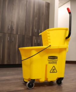 A split-bucket mopping system on a commercial floor in a Sioux Falls office
